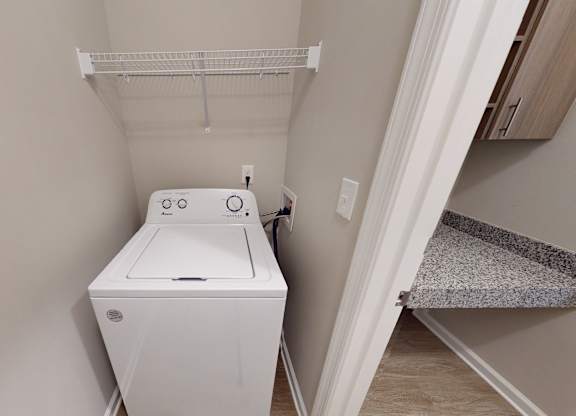 a washer and dryer included in every unit