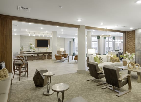 Clubhouse with kitchen, seating, fireplace and lounge areas