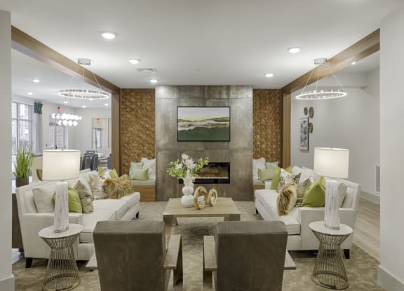 Clubhouse with seating and fireplace; flat screen TV