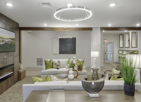 Clubhouse with seating and fireplace; flat screen TV