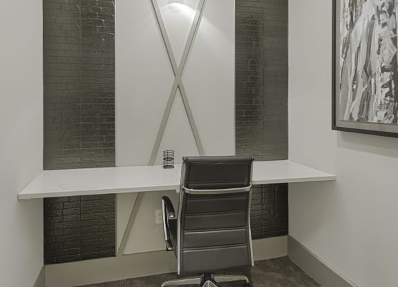 Work space in clubhouse with desk and sliding door