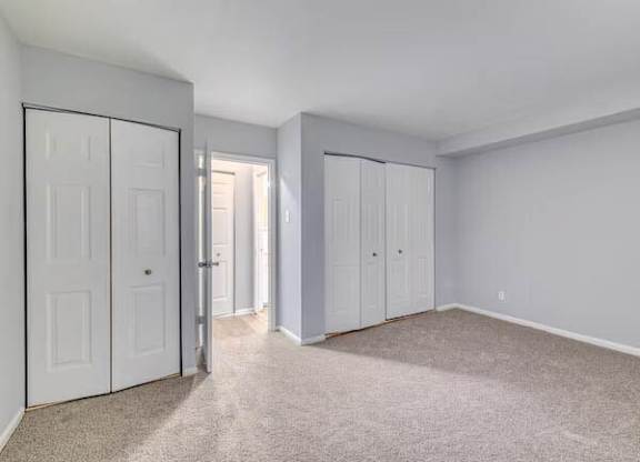 A room with white doors and carpeted floor at Brookshire Trace Townhomes Apartments, Pennsylvania
