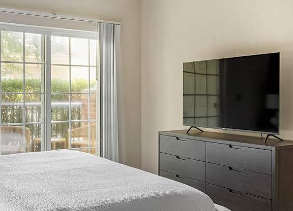 Bedroom With TV at Riverview Landing @ Valley Forge, Eagleville, PA