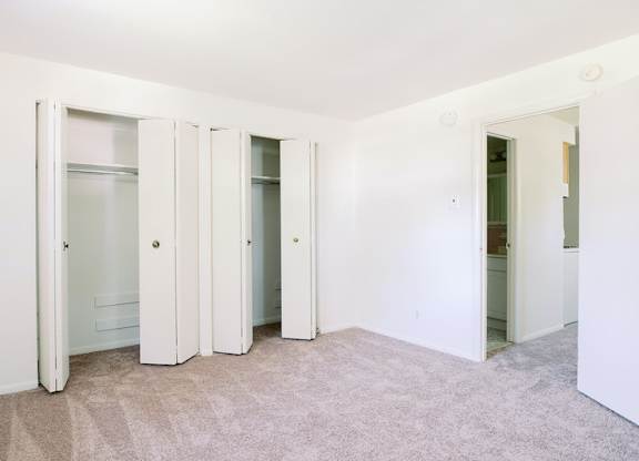 a room with three closets and a carpeted floor at Krewstown Park Apartments, Philadelphia Pennsylvania