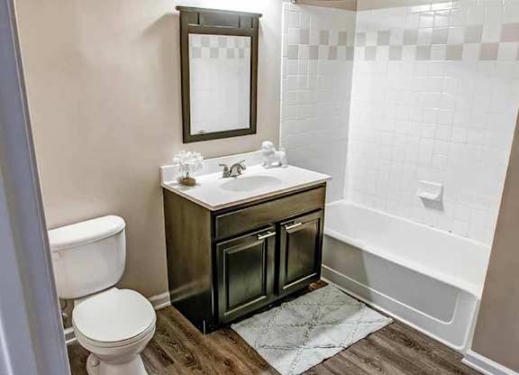 a bathroom with a sink toilet and a bath tub at Riverview Landing @ Valley Forge, Eagleville, PA