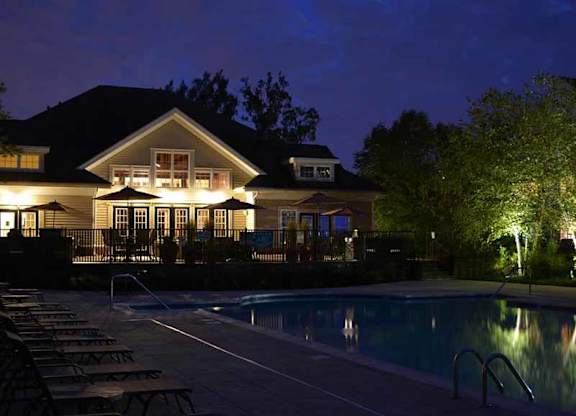 a house with a swimming pool at night at Riverview Landing @ Valley Forge, Pennsylvania