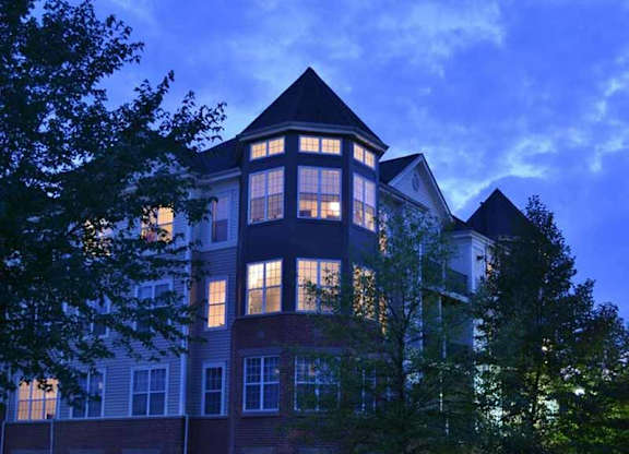 a building with lights on at night at Riverview Landing @ Valley Forge, Pennsylvania, 19403