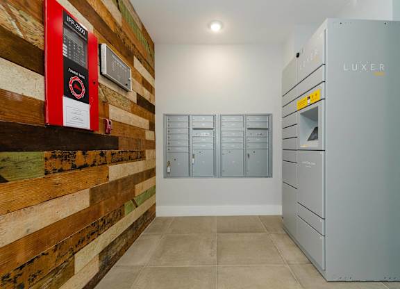 A LUXER branded storage unit sits in a room with a wooden wall.