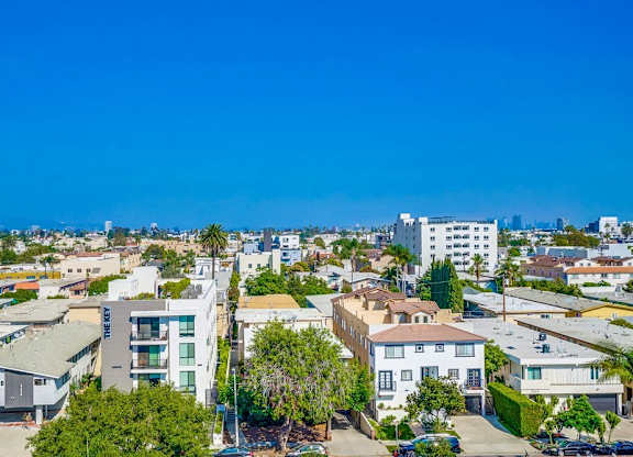 A residential area with houses and trees.