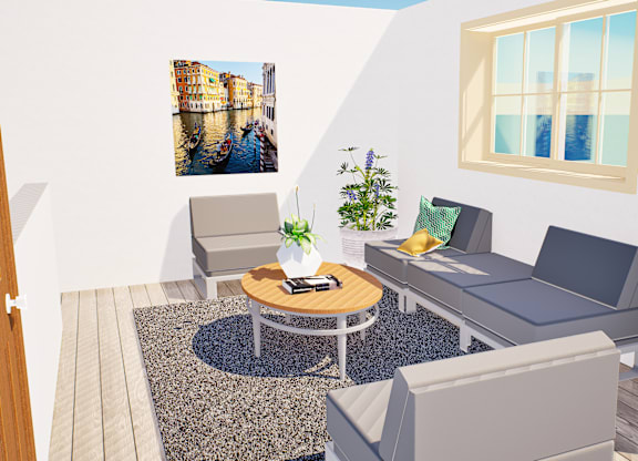 A living room with a grey couch, a coffee table, and a painting on the wall.