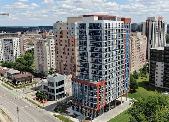 an aerial view of an apartment building in the city