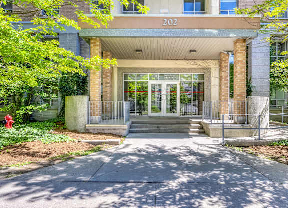 The front of a building with the number 202 on it.
