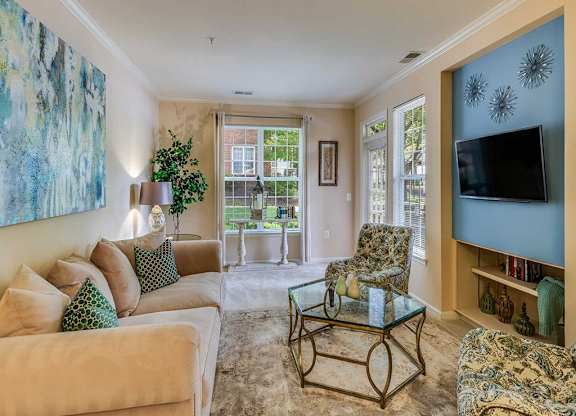a living room with a couch and a television