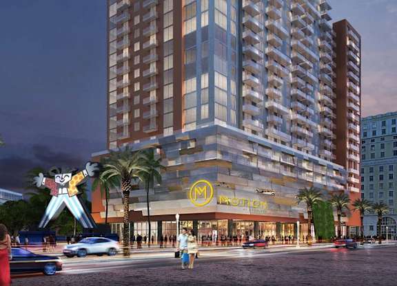 a rendering of a building with a statue on the street