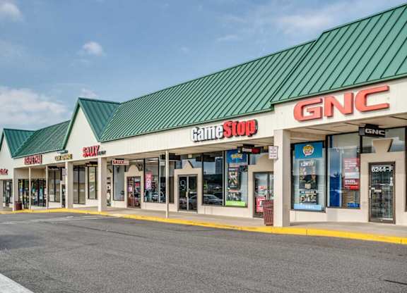 A GameStop store is located in a strip mall.