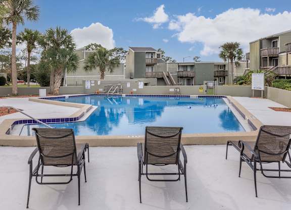 our apartments have a large pool and lounge chairs
