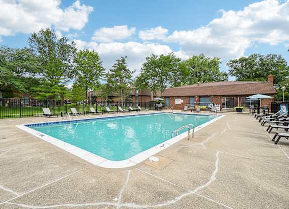 Heated pool and sundeck at Drawbridge Apartments in Harrison Township, MI.
