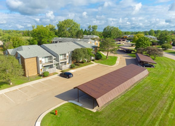 Three Oaks Apartments Exterior and Carport at Three Oaks Apartments, Troy, MI