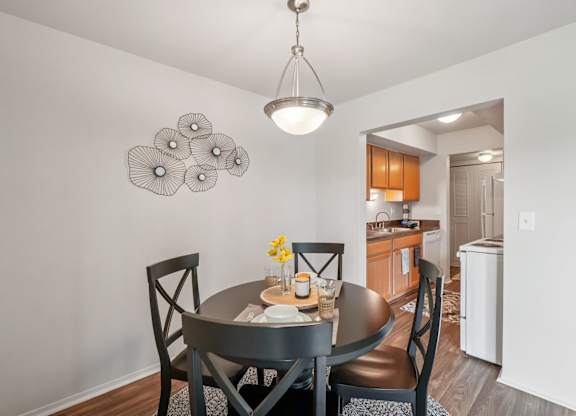 Spacious dining room area at Drawbridge Apartments in Harrison Township, MI.