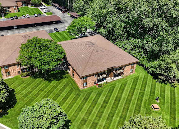 Lush green yard at Eastwood Village Apartments in Clinton Township, MI.
