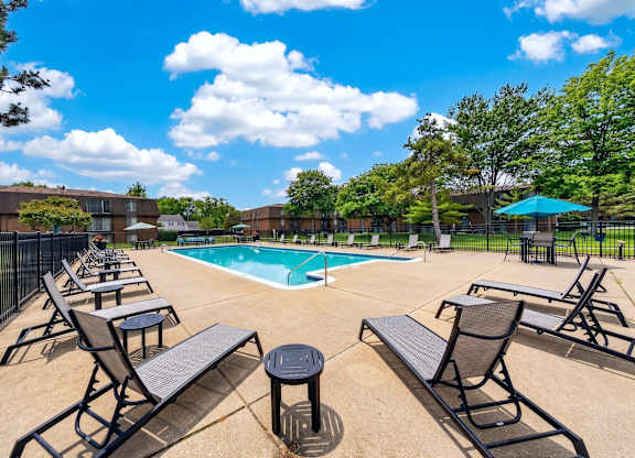 Heated pool and sundeck at Drawbridge Apartments in Harrison Township, MI.