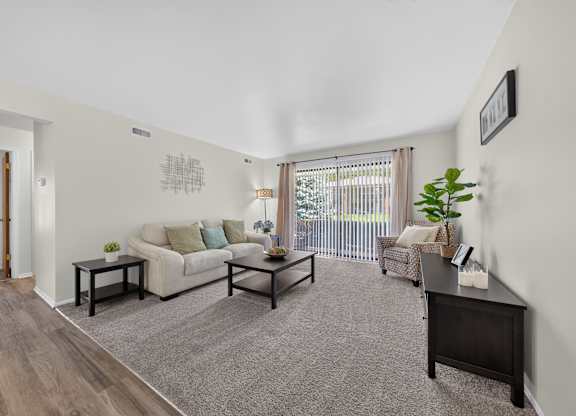 Open living room with natural light at Eastwood Village Apartments in Clinton Township, MI.