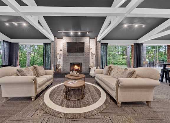 Community clubhouse with coworking lounge at Eastwood Village Apartments in Clinton Township, MI.
