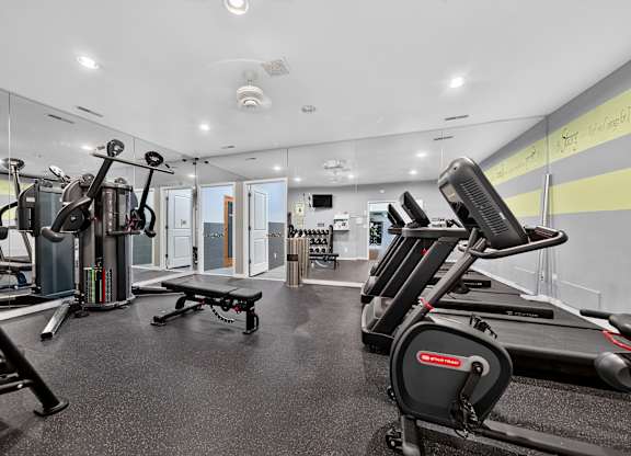 24-hour fitness center and Eastwood Village Apartments in Clinton Township, MI.