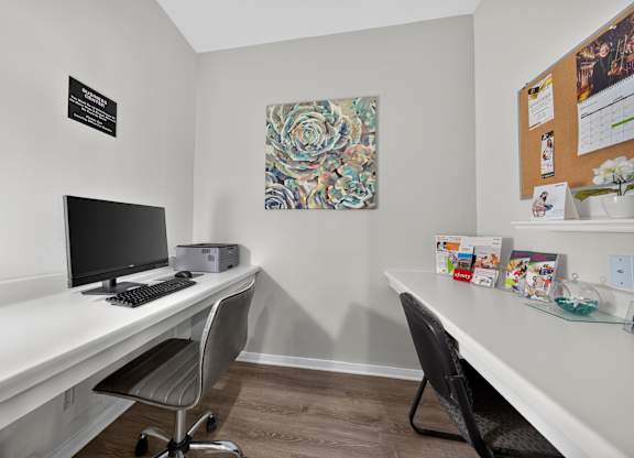 Clubhouse with coworking lounge at Eastwood Village Apartments in Clinton Township, MI.
