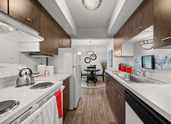 Modern and spacious kitchen at Knottingham Apartments in Clinton Township, MI.