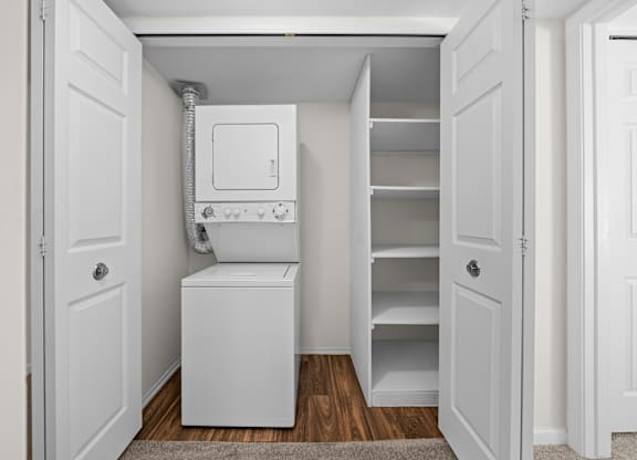 Spacious In-unit Laundry and Linen Closet at Lakeside Village Apartments Clinton Township MI