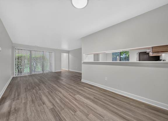 Open and airy dining and living room at Park Lane Apartments in Southfield, MI.