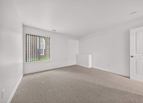 Spacious bedroom with ample storage at Park Lane Apartments in Southfield, MI.