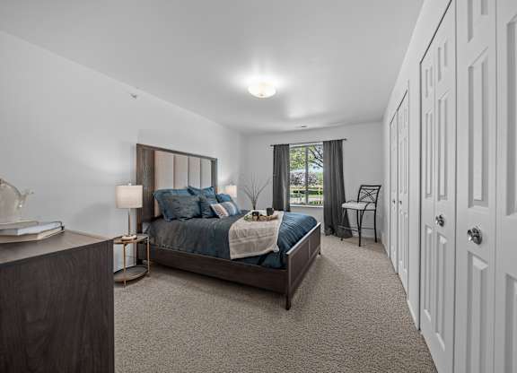 Bedroom with Ample storage space at Prentiss Pointe Apartments in Harrison Township, MI