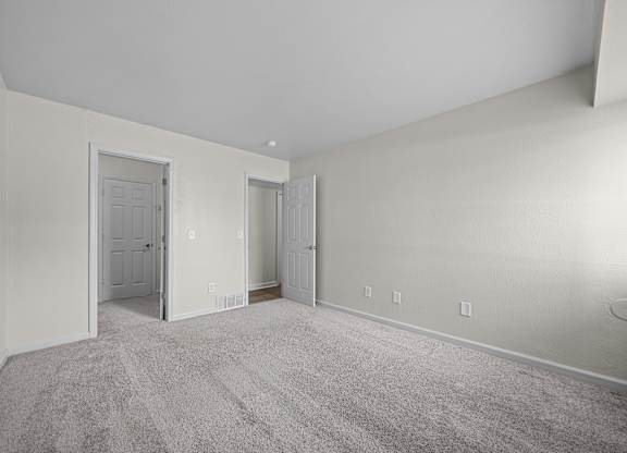 Large bedroom at Three Oaks Apartments in Troy, MI