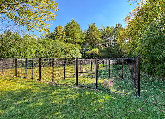 Spacious fenced-in Dog Park at Three Oaks Apartments in Troy, MI