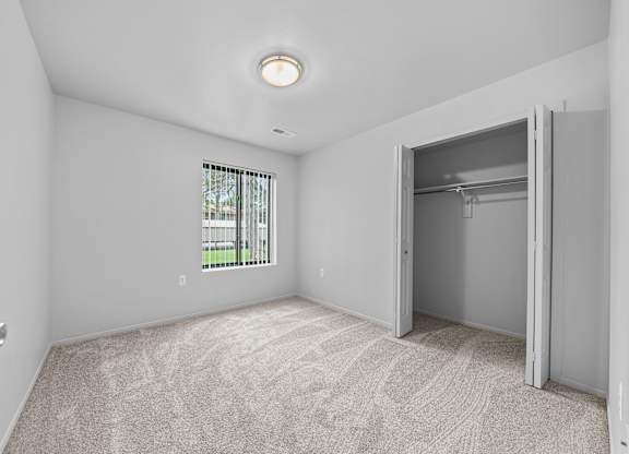 Big bedroom with natural lighting at Westwood Village Apartments in Westland, MI