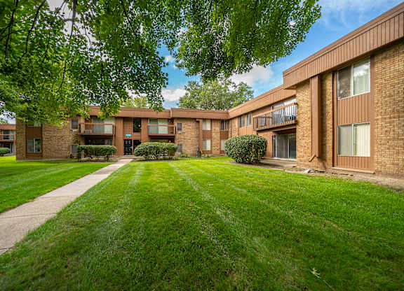 Cozy building exterior at Westwood Village Apartments in Westland, MI.