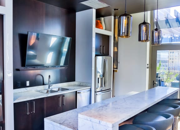 Clubroom Kitchen at Arcade Artist Apartments, St Louis, MO