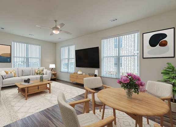 A living room with a wooden coffee table and a flat screen TV.