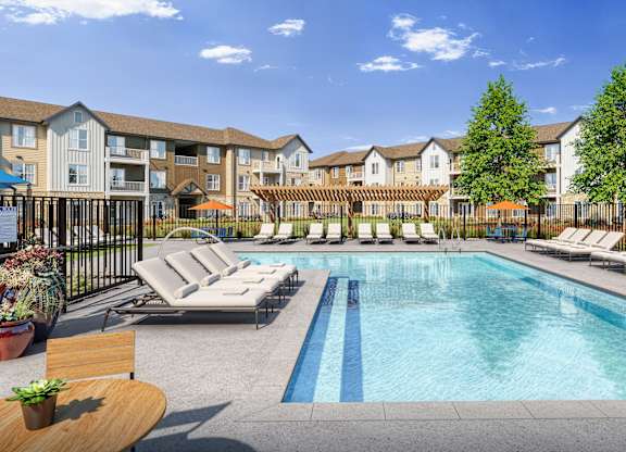 A Pool with Lounge Chairs at Anson Crossing Apartments, Maxwell, 78656
