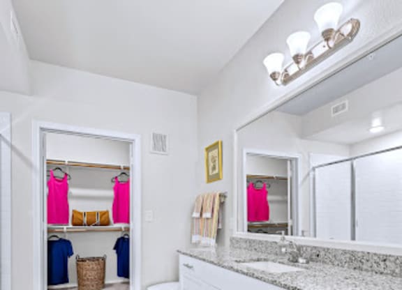 Bathroom With Vanity Lights at Mariposa at Harris Road Arlington 55+ Apartments, Arlington