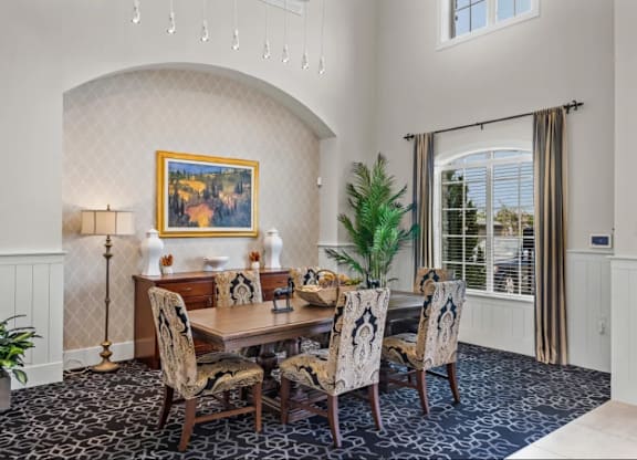 a dining room with a table and chairs and a window at Cypress Creek at River Oaks, Waxahachie, 75165