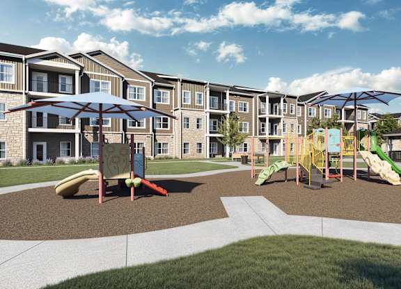 A playground area with slides and swings in front of apartment buildings at Sage at Franklin Park Apartment , Texas, 78744