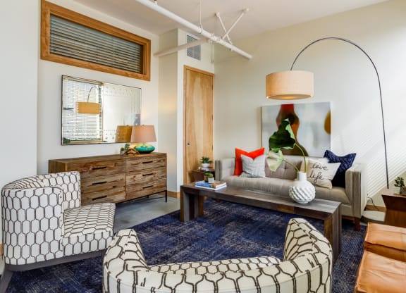 Living room with natural sunlight at Arcade Apartments, St Louis, MO