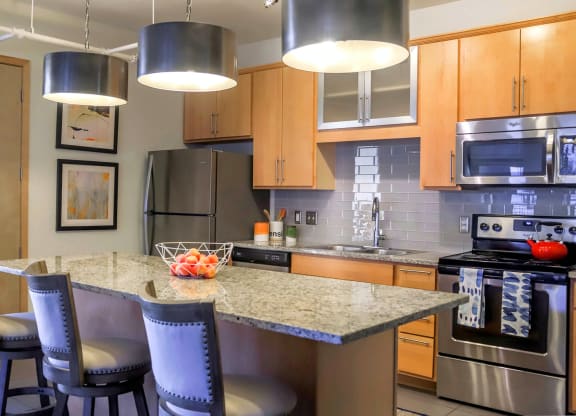 Kitchen with gas stove at Arcade Apartments, St Louis