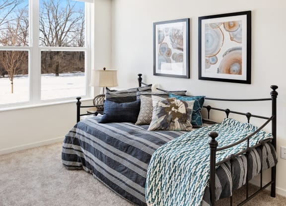 Blue Bedroom With Window at The Bluffs at Liberty Glen, Minnesota 56304