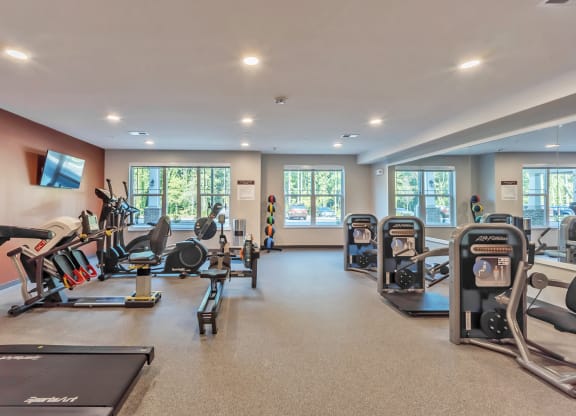 Fitness Center with equipment at Covington Crossings 55+ Senior Living, Georgia