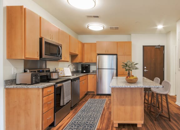 Fully furnished Kitchen at Haven at Congaree Pointe 55+ Apartments, Columbia, SC