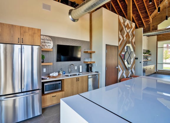 Kitchen with appliances at Heritage at Church Ranch 55+ Apartments, Westminster , Colorado